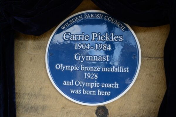 photograph of blue plaque for Carrie Pickles bronze medallist in gymnastics at 1928 Olympics