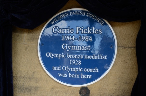photograph of blue plaque for Carrie Pickles bronze medallist in gymnastics at 1928 Olympics