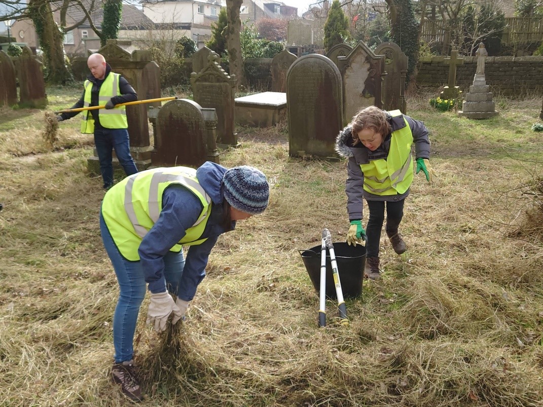 photograph of volunteers at work on the project