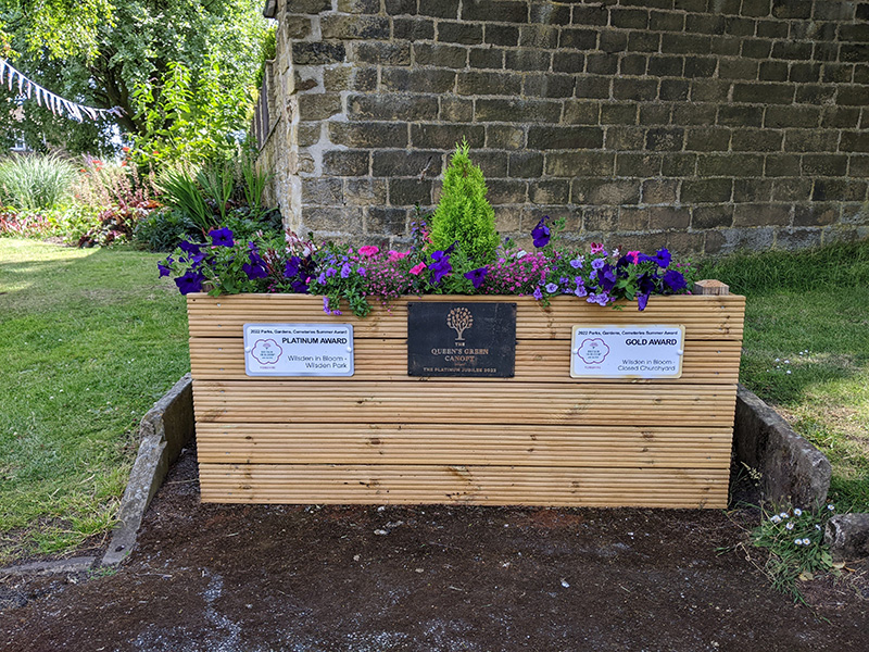 Wilsden in Bloom's display of Platinum award Wilsden Park, & Gold award for Closed Churchyard 2022